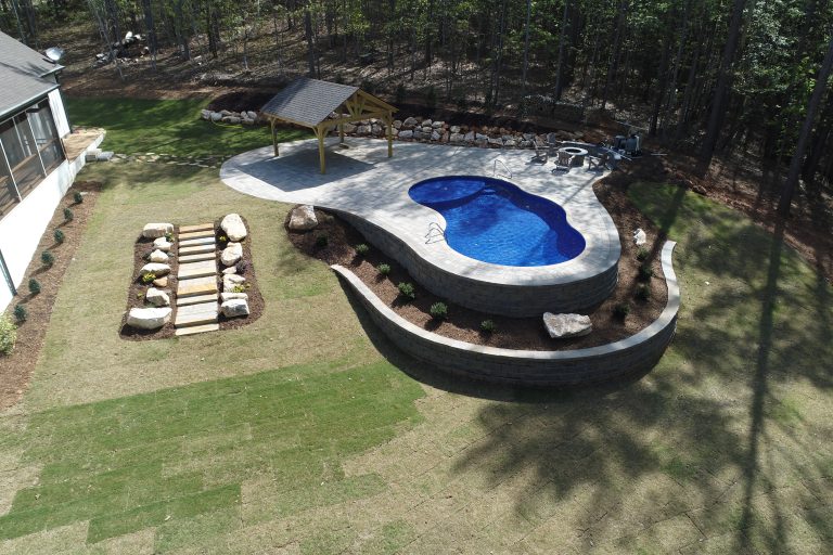 A swimming pool with a gazebo.